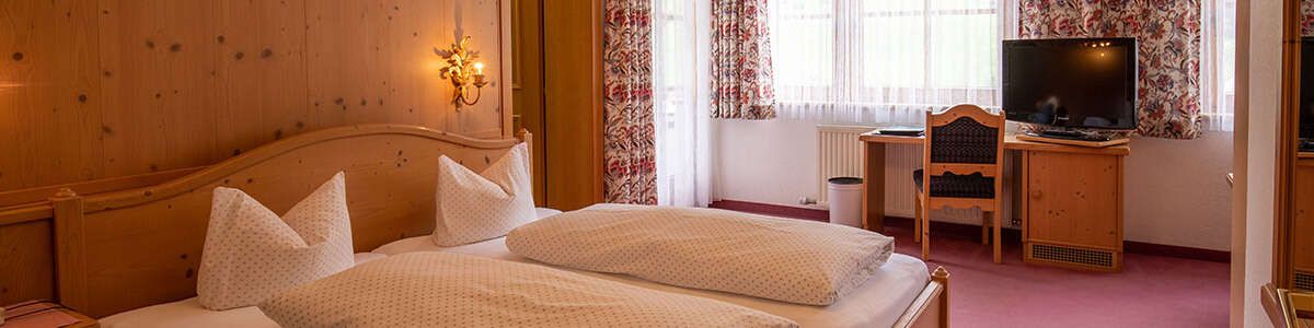 Comfort double room with balcony in the Hotel Persura in Paznaun